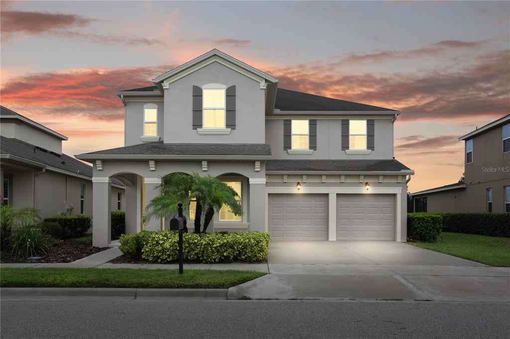 14448 Magnolia Ridge Loop Winter Garden, FL 34787 - Photo 1 of 1 Exterior Front w/ Virtual Twilight.