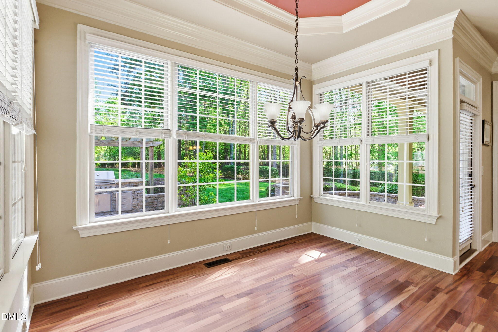 2008 Peaceful Road Wake Forest, NC 27587 - Photo 21 of 89 a view of an empty room with wooden floor and a window