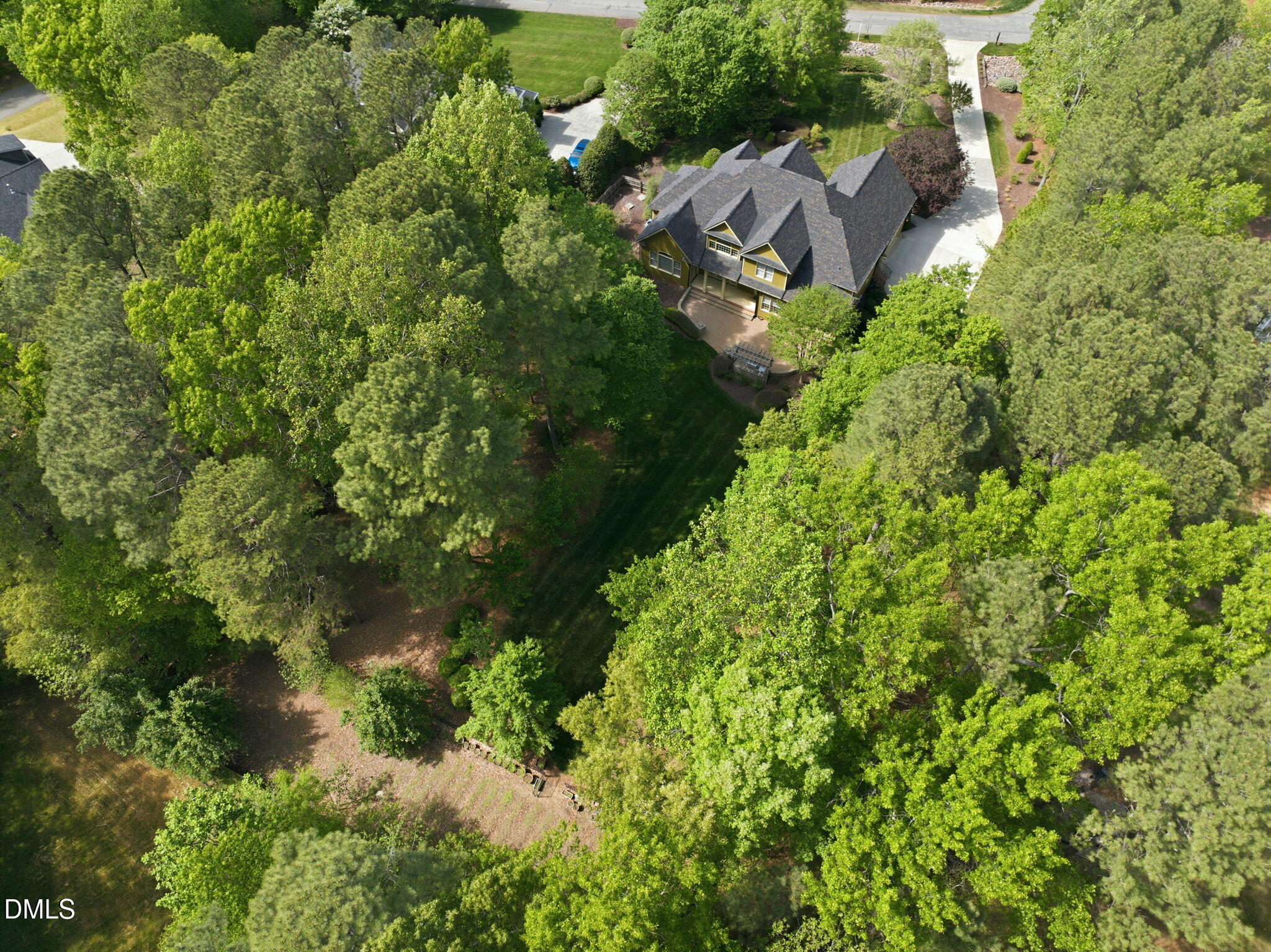 2008 Peaceful Road Wake Forest, NC 27587 - Photo 82 of 89 an aerial view of residential house with outdoor space and trees all around