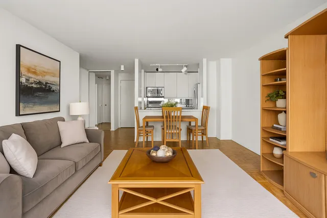 a living room with furniture fireplace and a flat screen tv