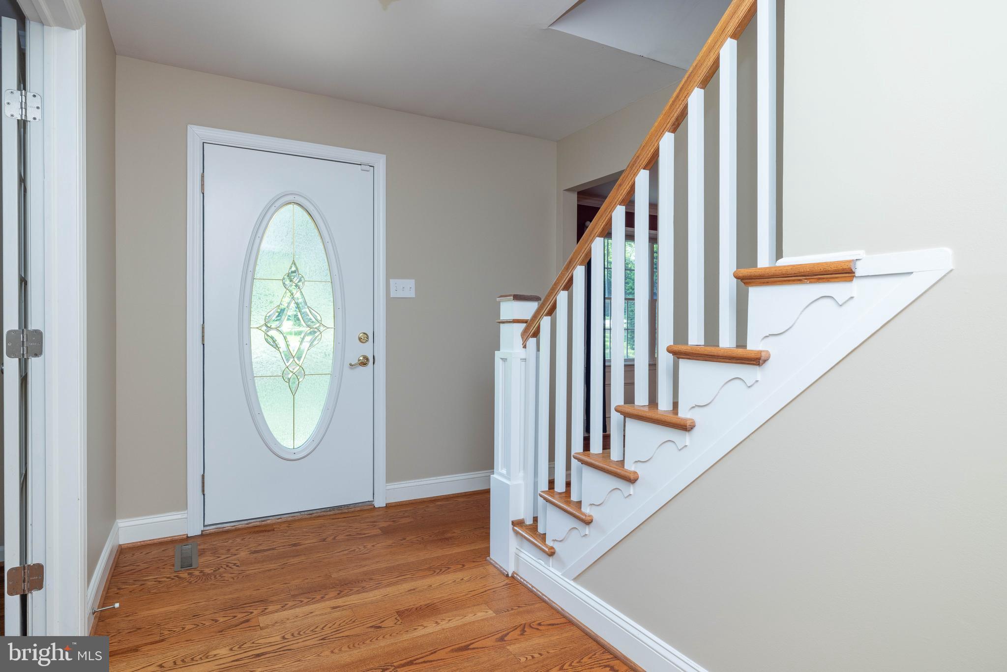 17 Bridleshire Road Newark, DE 19711 - Photo 20 of 62 a view of a hallway with wooden floor and entryway