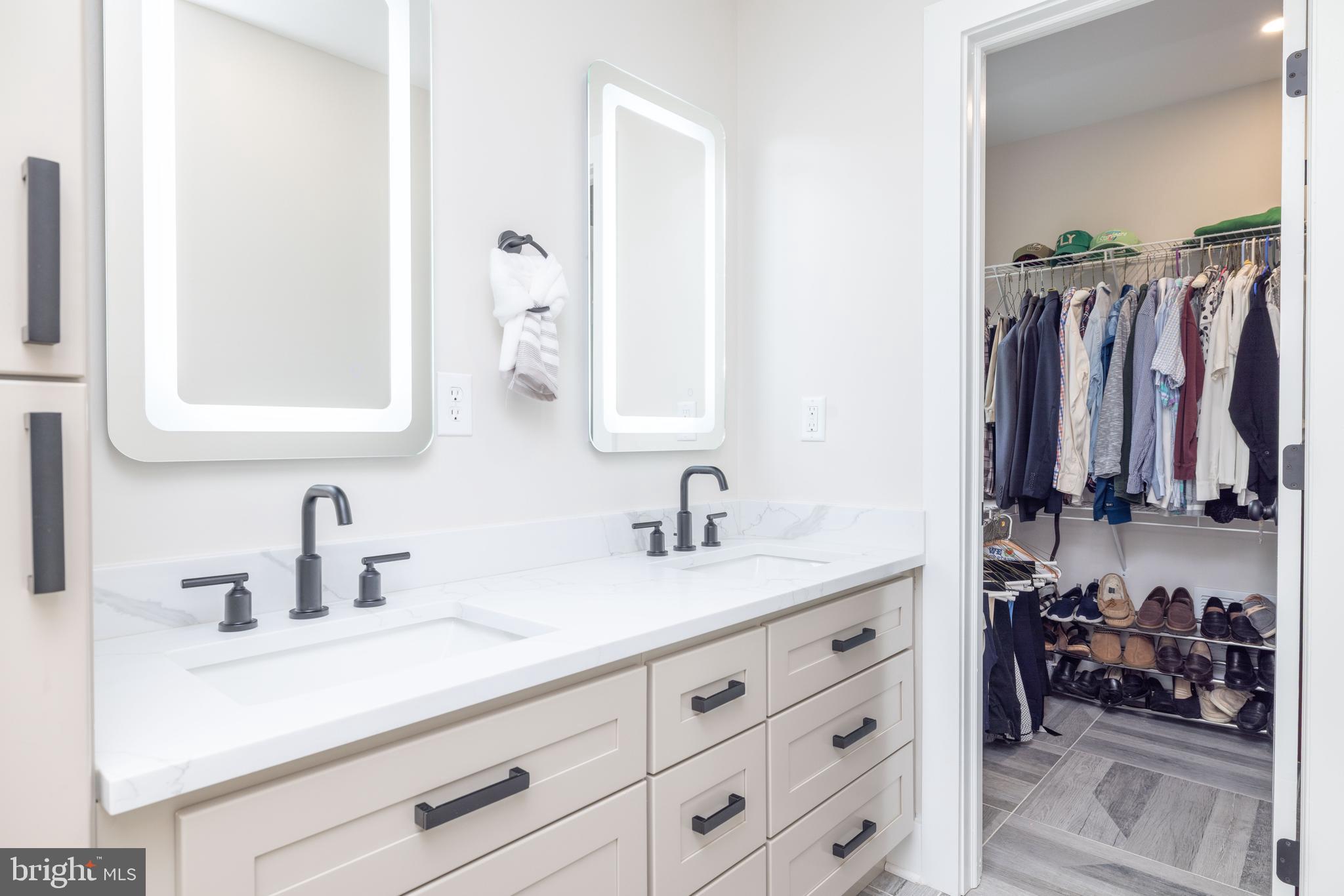 17 Bridleshire Road Newark, DE 19711 - Photo 25 of 62 a bathroom with a sink and a mirror