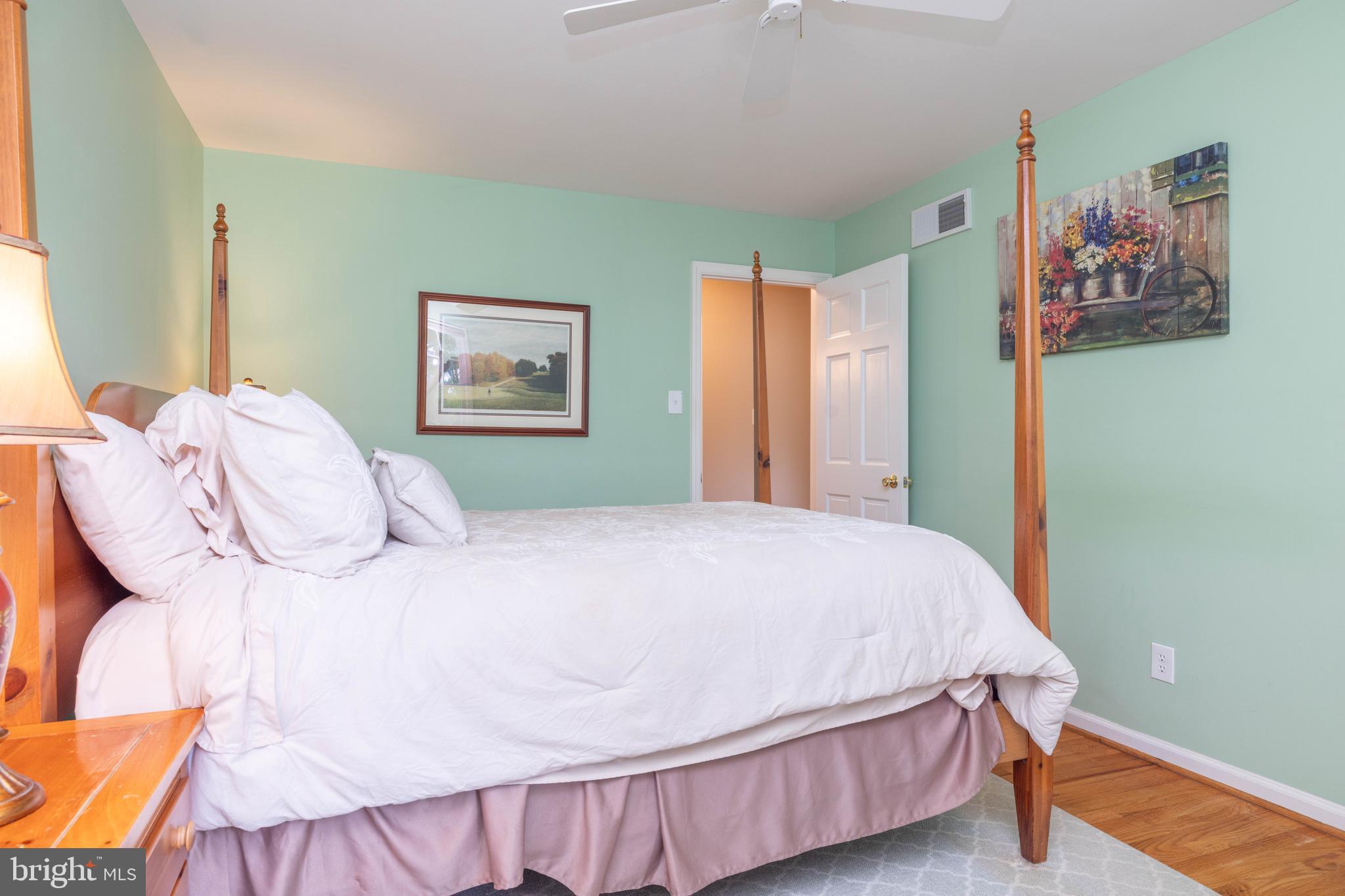 17 Bridleshire Road Newark, DE 19711 - Photo 28 of 62 a bedroom with a bed and painting on the wall