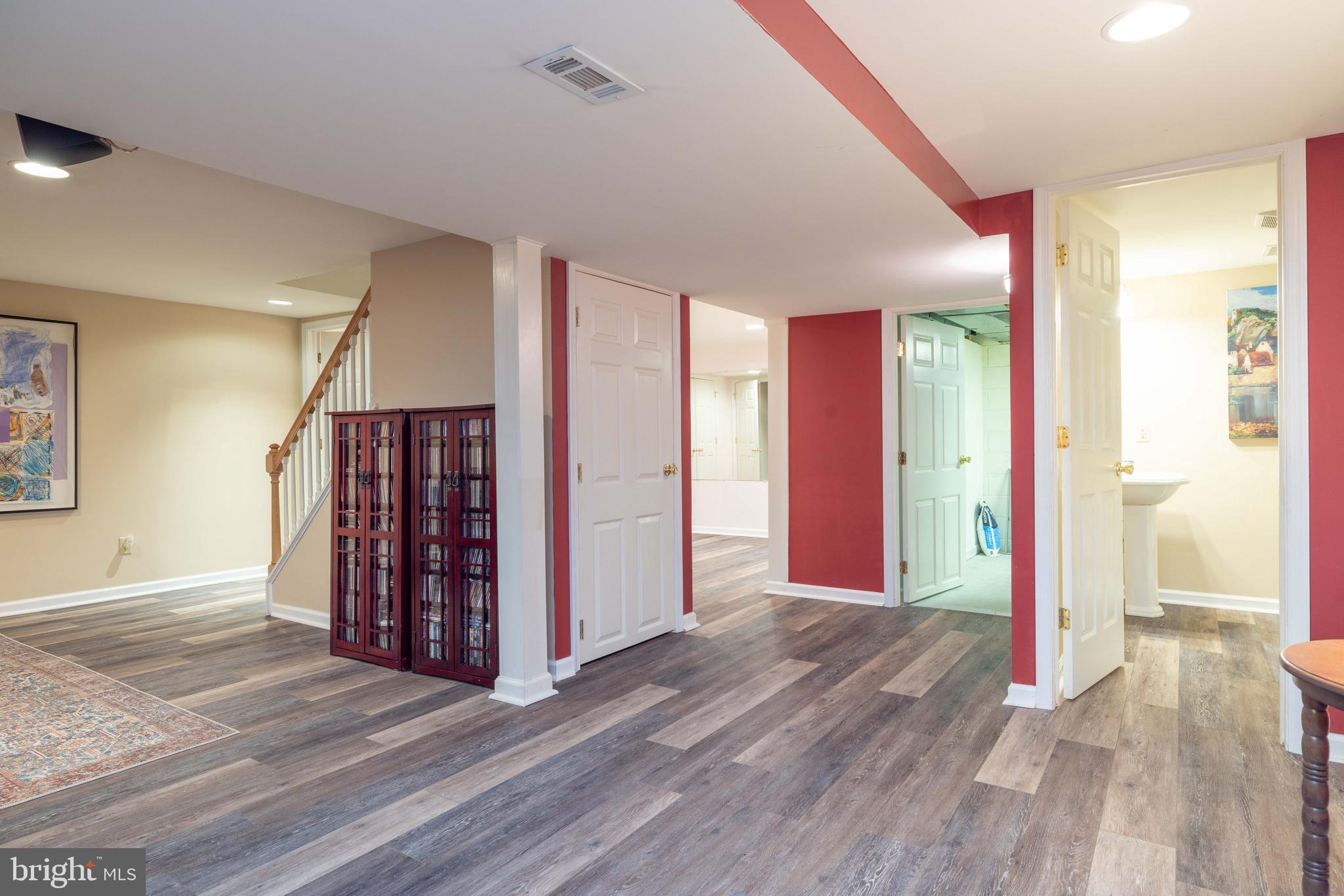 17 Bridleshire Road Newark, DE 19711 - Photo 44 of 62 a view of a livingroom with wooden floor and stairs