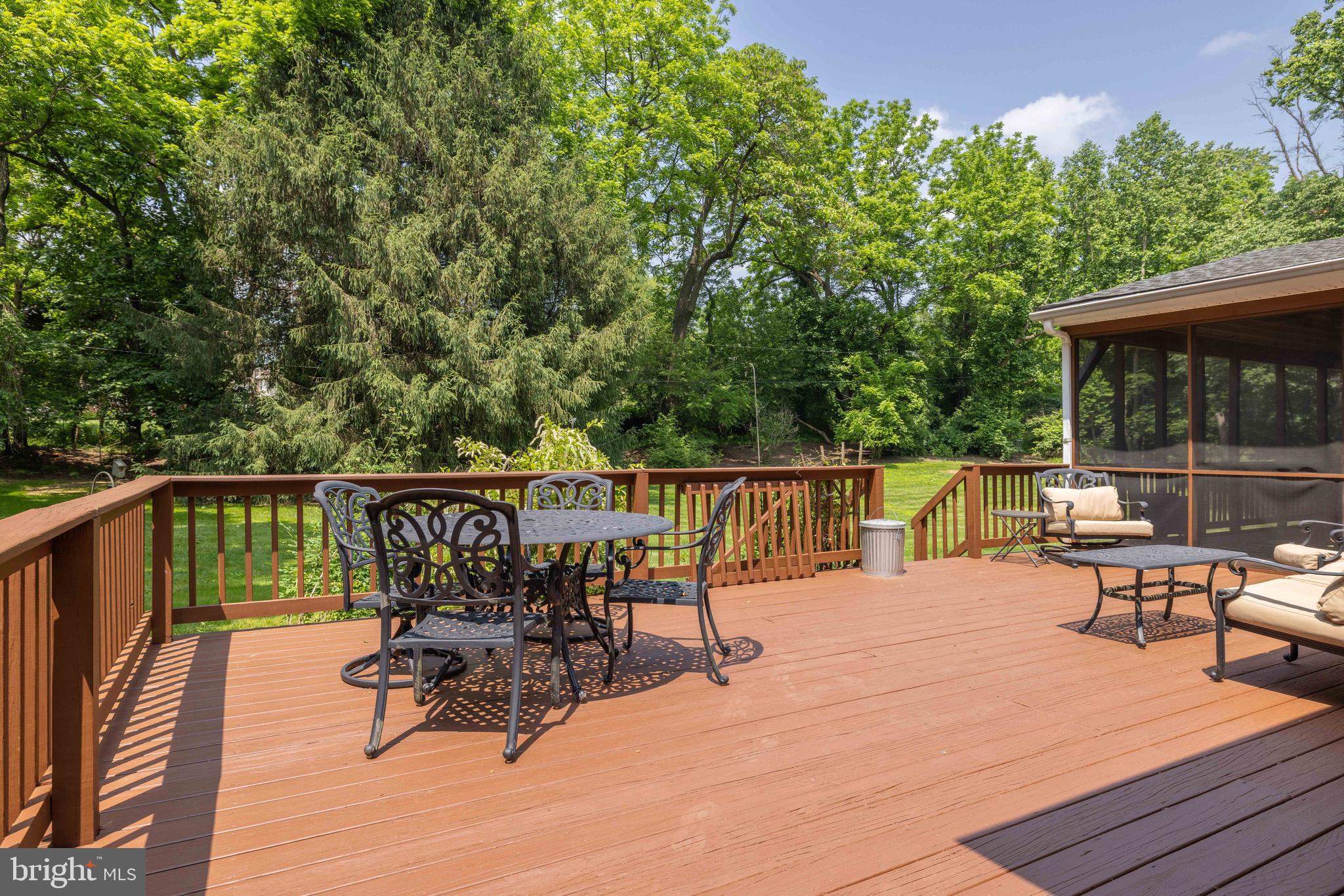 17 Bridleshire Road Newark, DE 19711 - Photo 54 of 62 a view of a chairs and table on the wooden deck
