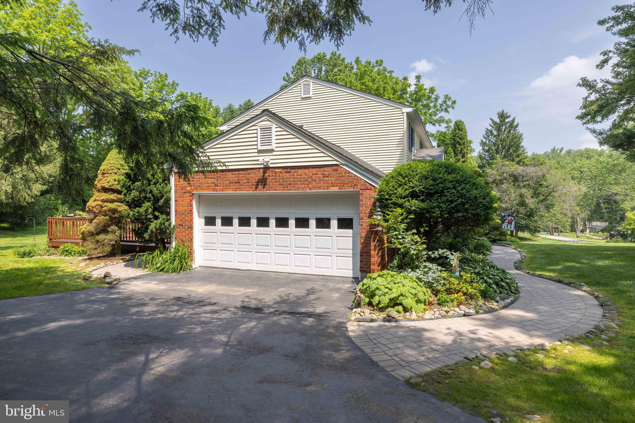 17 Bridleshire Road Newark, DE 19711 - Photo 60 of 62 a view of a house with a yard and a garage