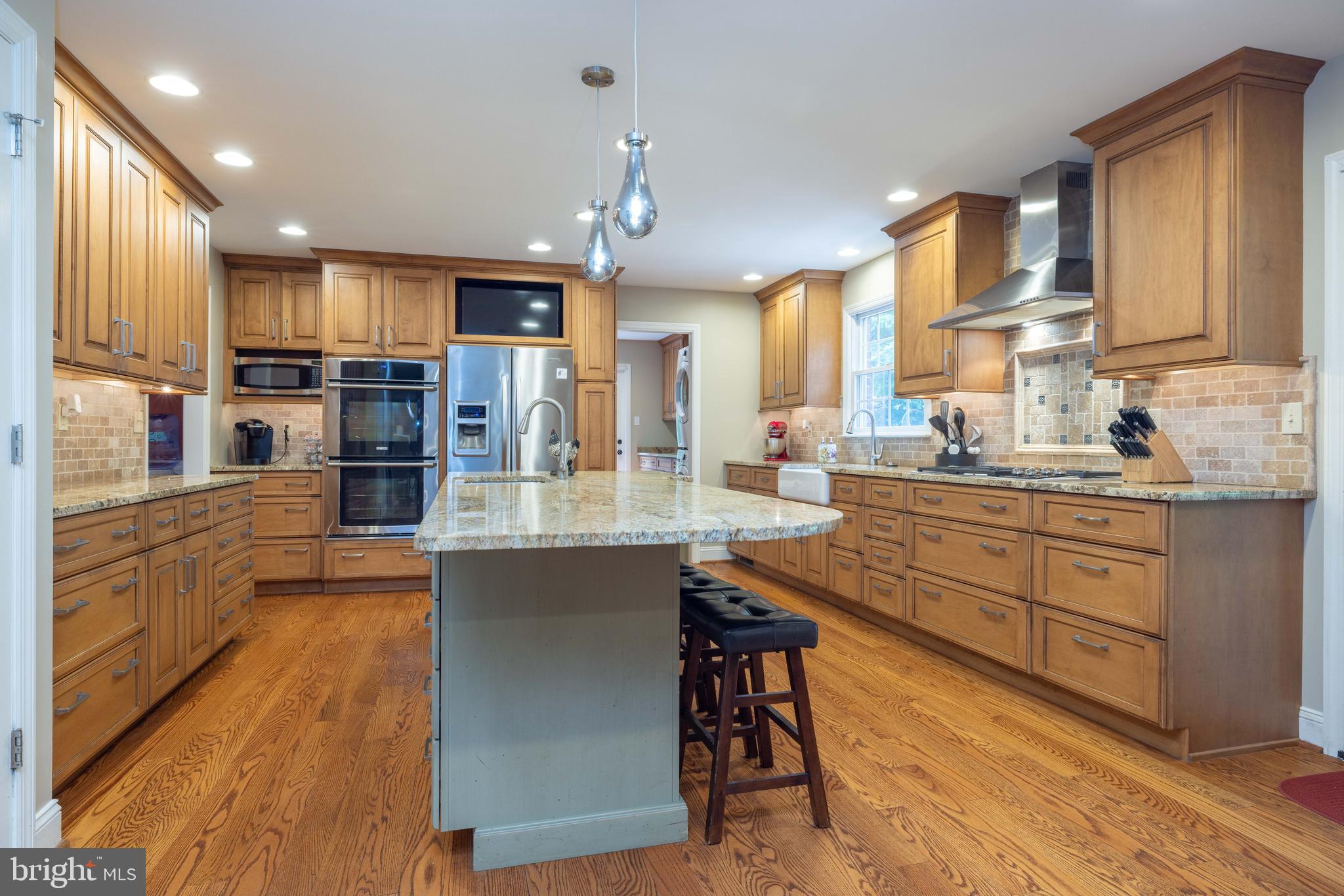 17 Bridleshire Road Newark, DE 19711 - Photo 6 of 62 a kitchen with stainless steel appliances kitchen island granite countertop a sink and cabinets