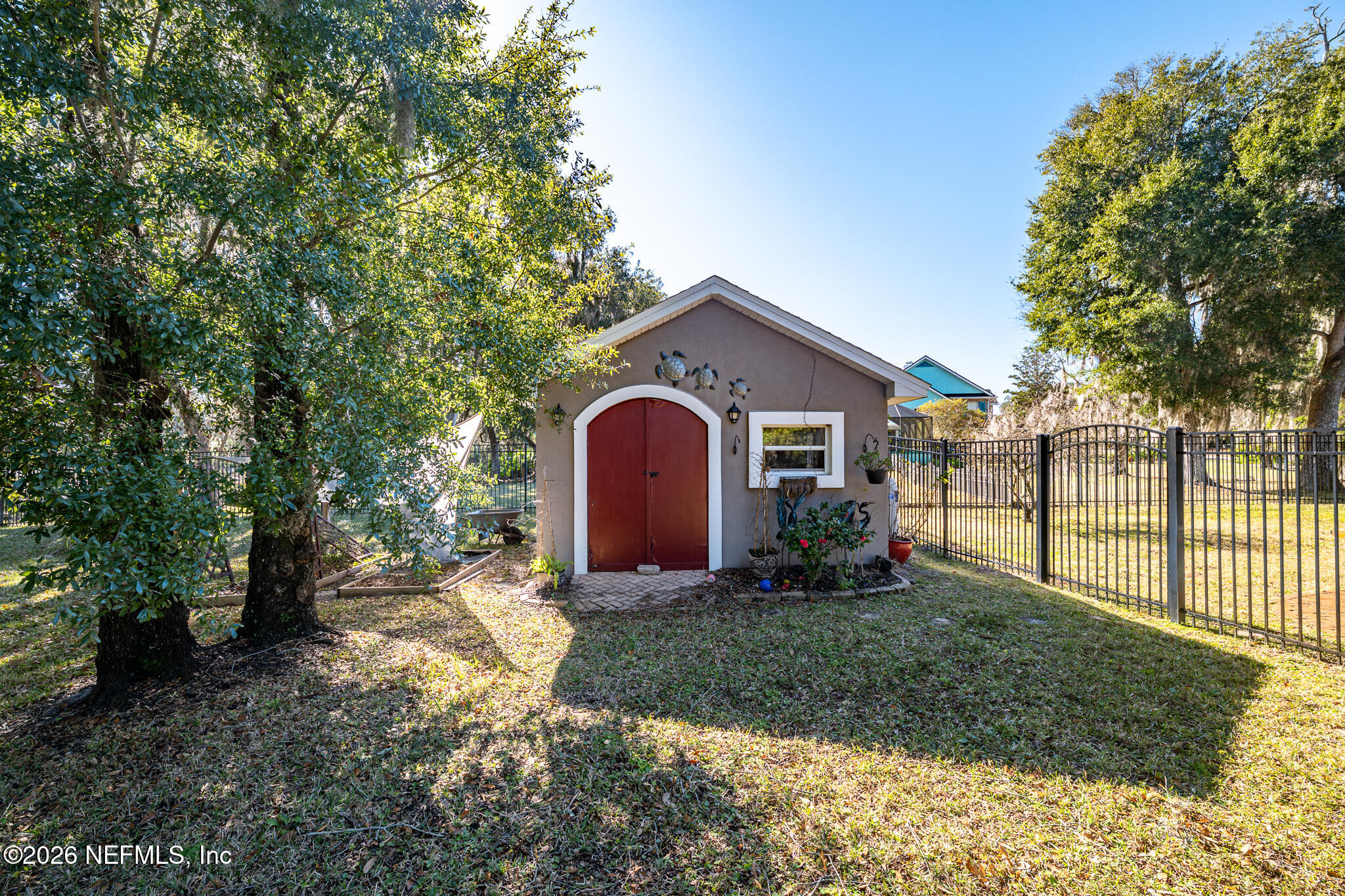 707 Standish Court St. Augustine, FL 32086 - Photo 61 of 69 61 Backyard - Shed