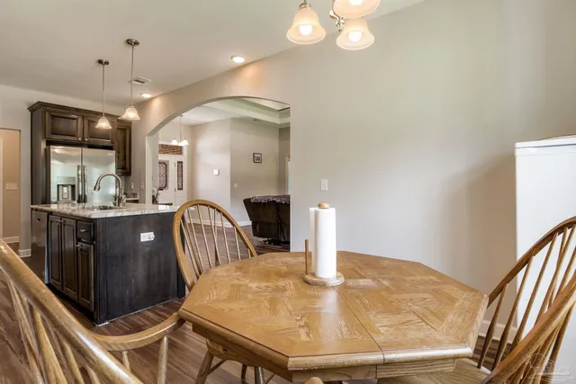 a bathroom with a shower and a sink