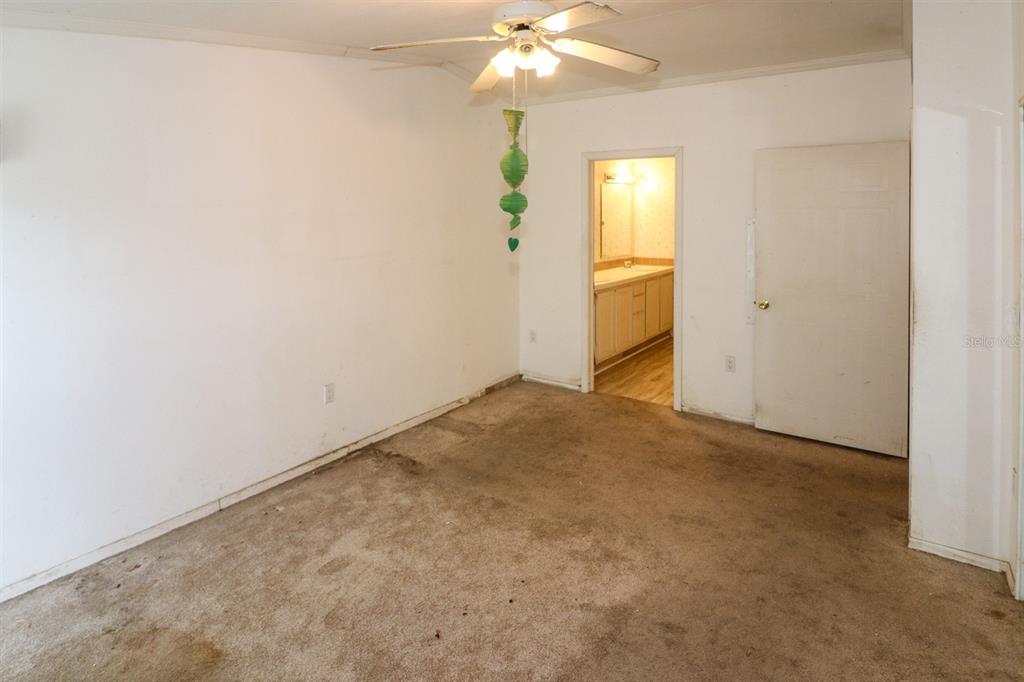 29200 South Jones Loop Road, Unit 205 Punta Gorda, FL 33950 - Photo 16 of 25 an empty room with a bathroom
