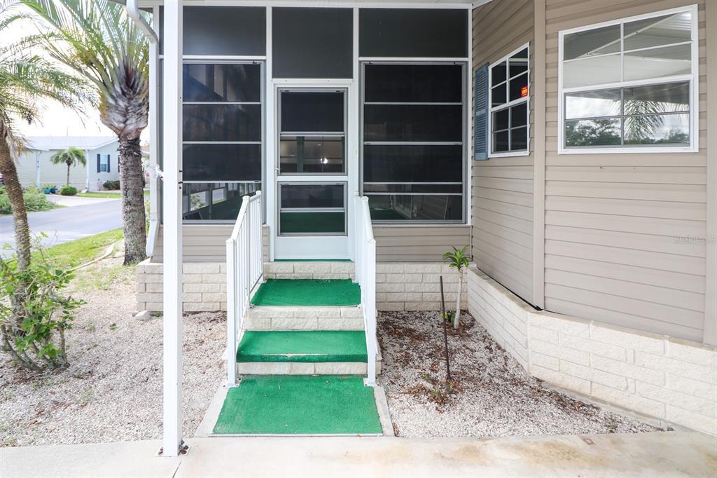 29200 South Jones Loop Road, Unit 205 Punta Gorda, FL 33950 - Photo 2 of 25 a view of front door of house