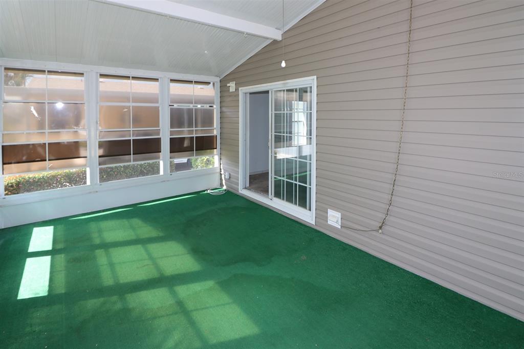 29200 South Jones Loop Road, Unit 205 Punta Gorda, FL 33950 - Photo 22 of 25 a view of an empty room with a window and balcony