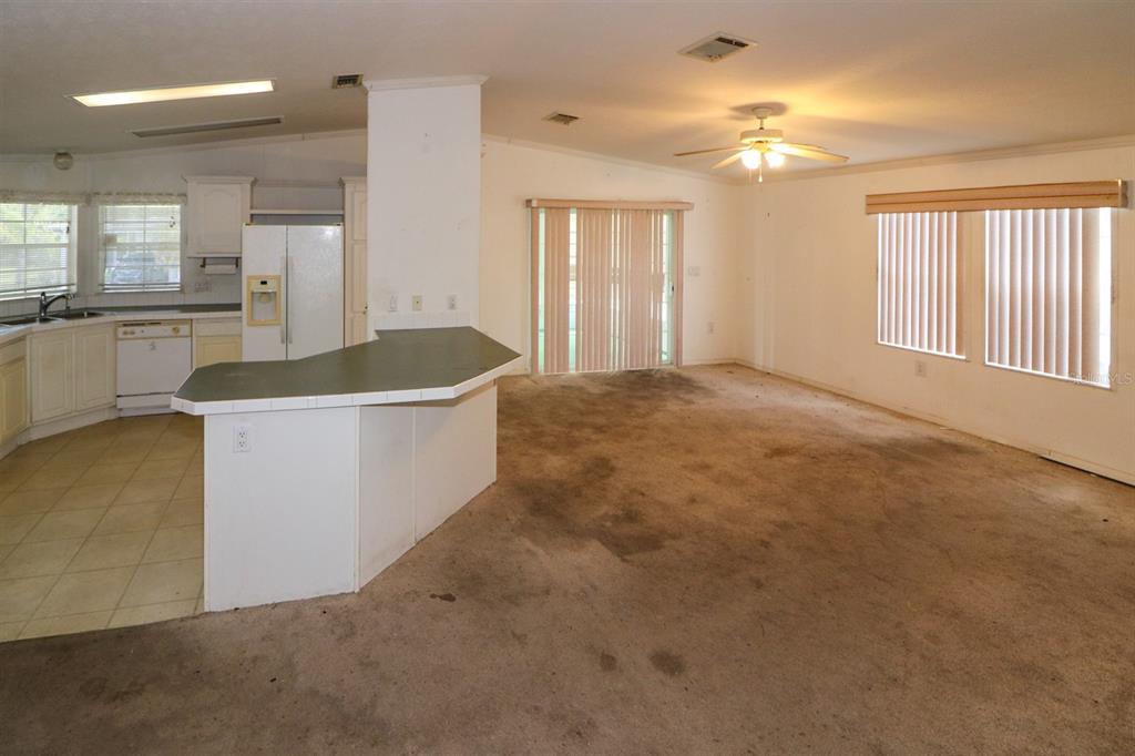 29200 South Jones Loop Road, Unit 205 Punta Gorda, FL 33950 - Photo 9 of 25 a view of a kitchen and a sink