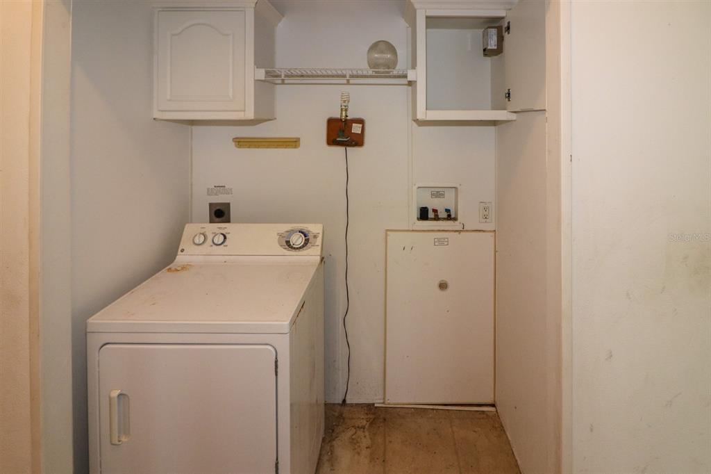 29200 South Jones Loop Road, Unit 205 Punta Gorda, FL 33950 - Photo 10 of 25 a utility room with dryer and washer