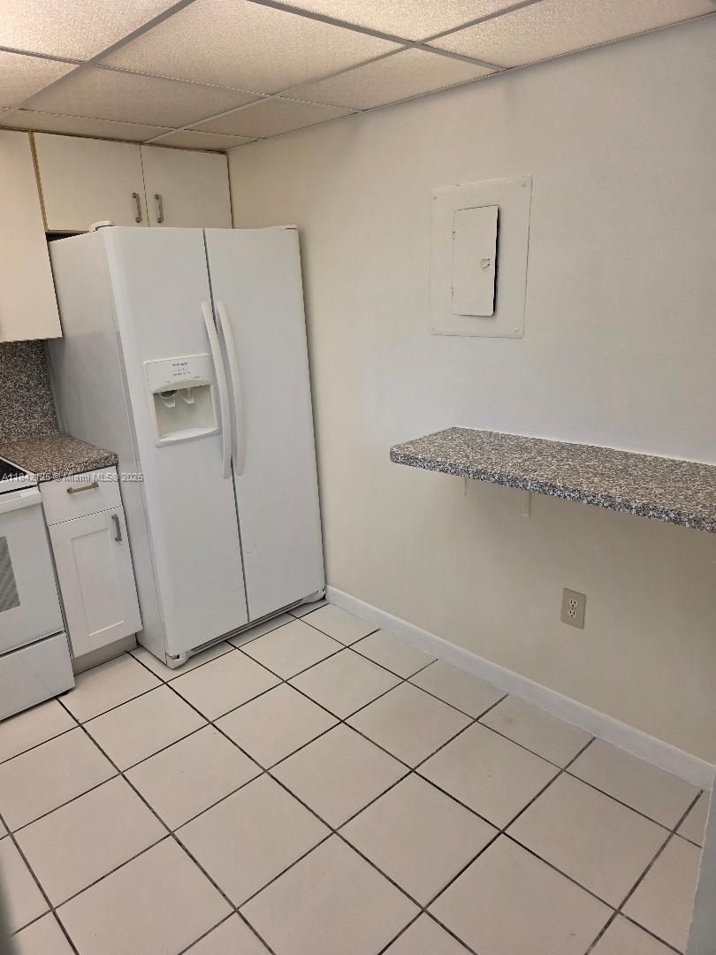 1121 Southwest 105th Avenue, Unit 322 Miami, FL 33174 - Photo 2 of 19 a view of a storage & utility room with cabinets