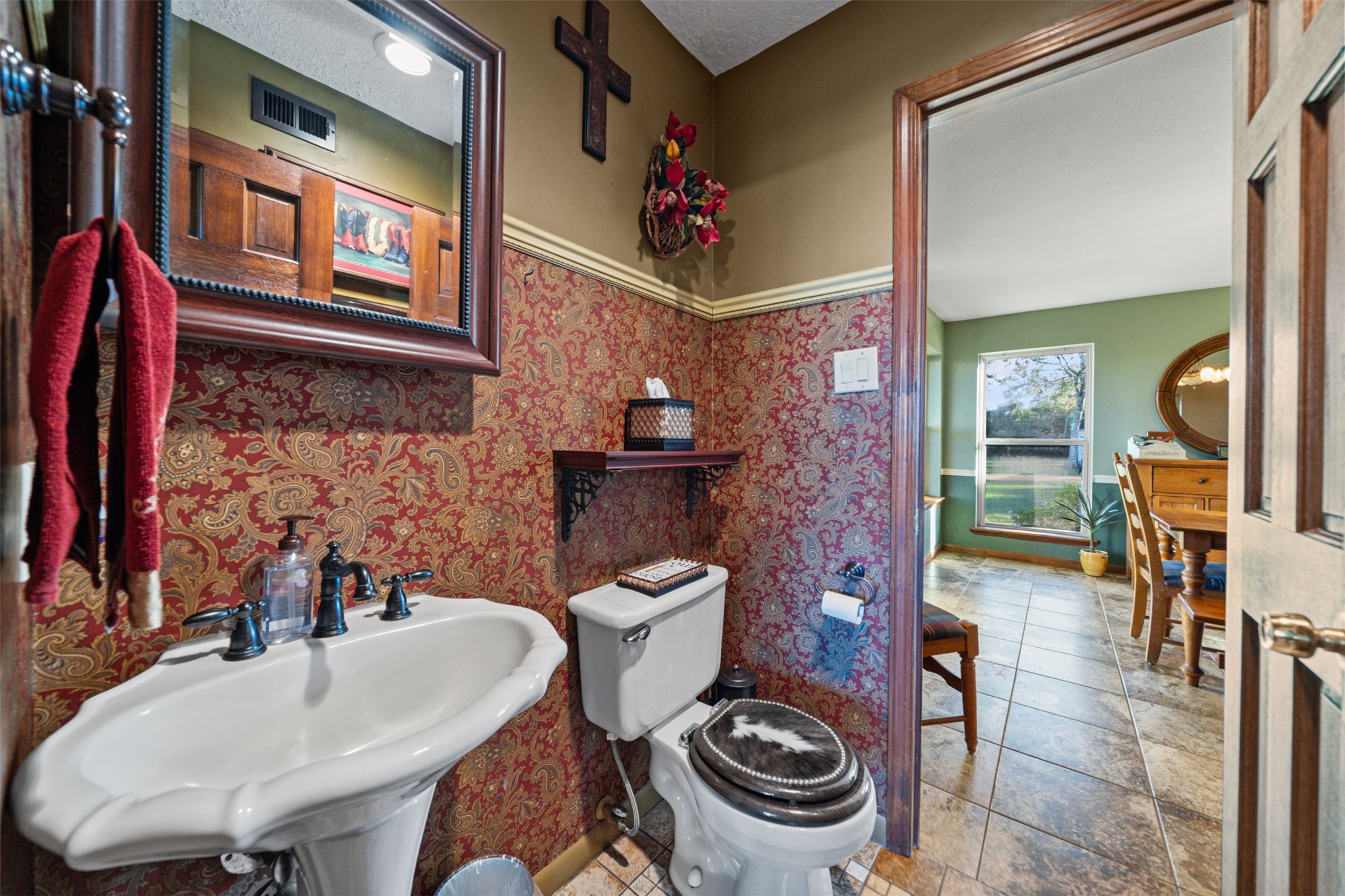 25948 Nelson Road Hempstead, TX 77445 - Photo 20 of 50 a bathroom with a sink a toilet and a mirror