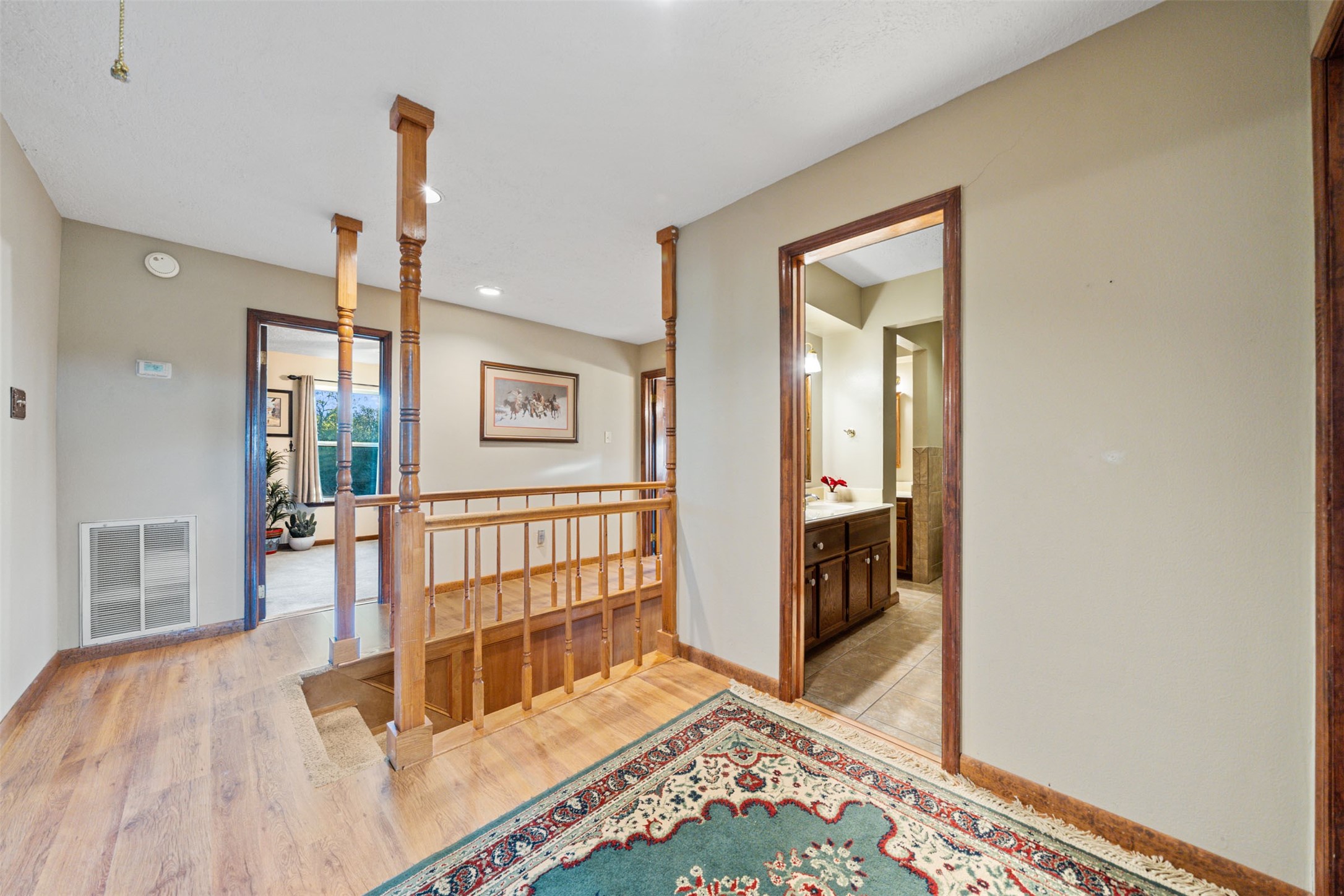 25948 Nelson Road Hempstead, TX 77445 - Photo 21 of 50 a view of a hallway with wooden floor and windows