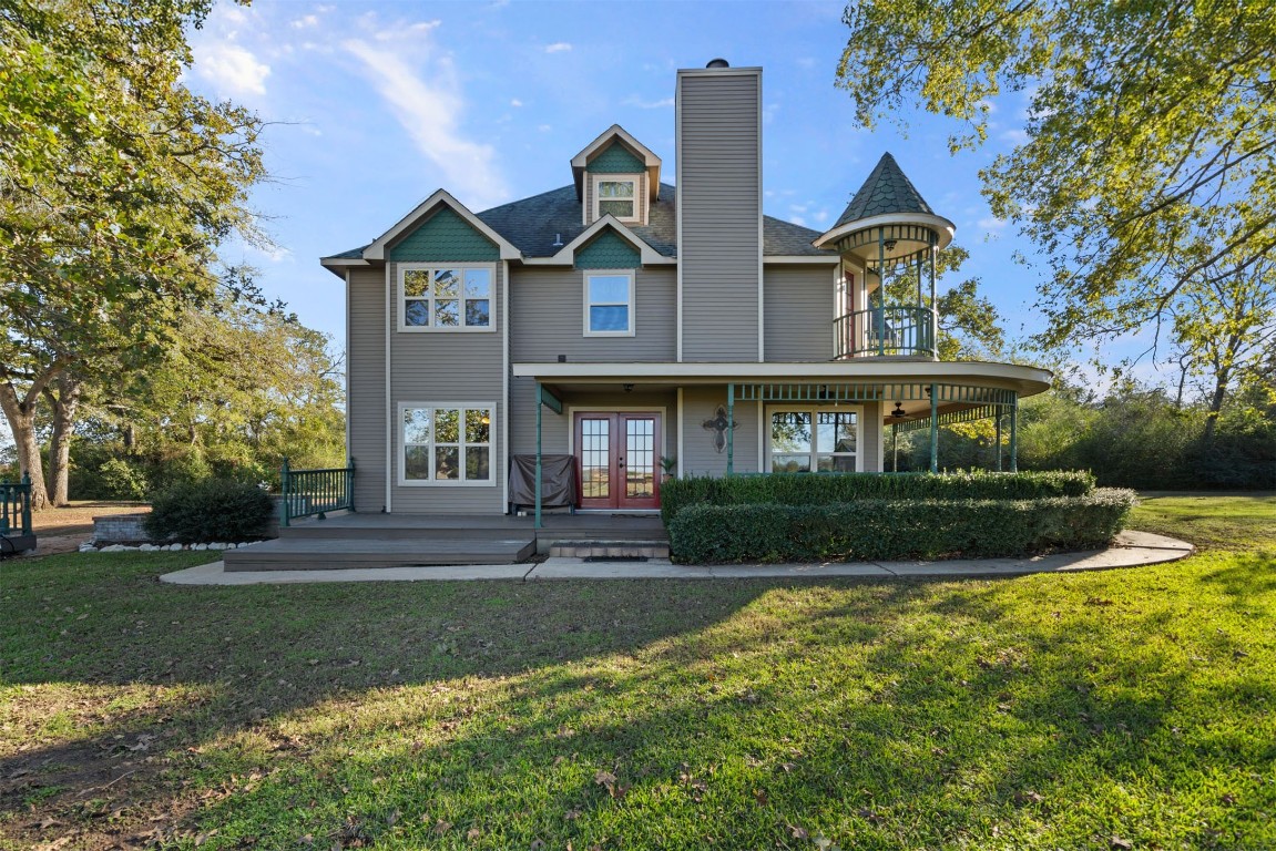 25948 Nelson Road Hempstead, TX 77445 - Photo 3 of 50 a front view of a house with a yard and plants