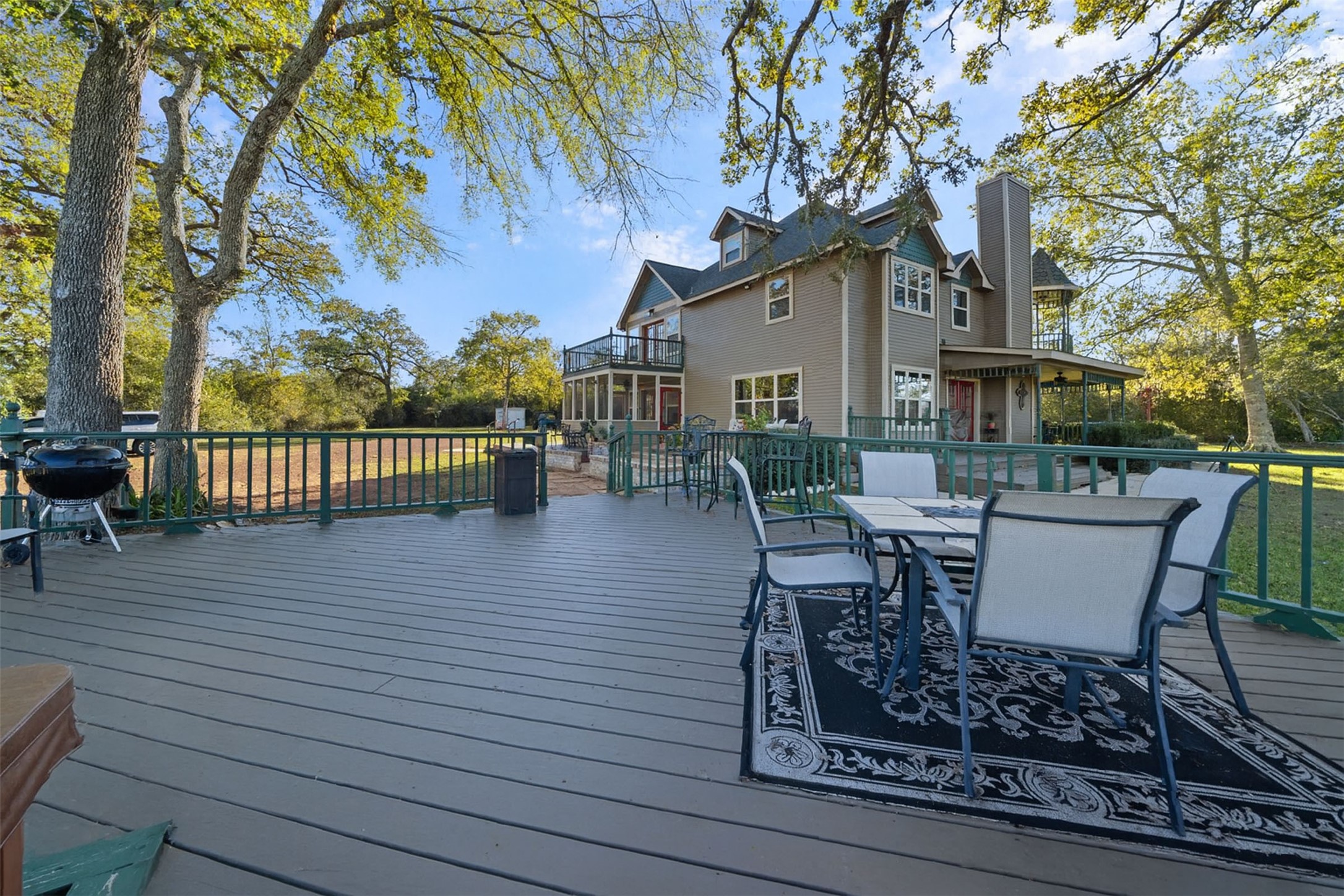 25948 Nelson Road Hempstead, TX 77445 - Photo 46 of 50 a view of a patio with a table and chairs