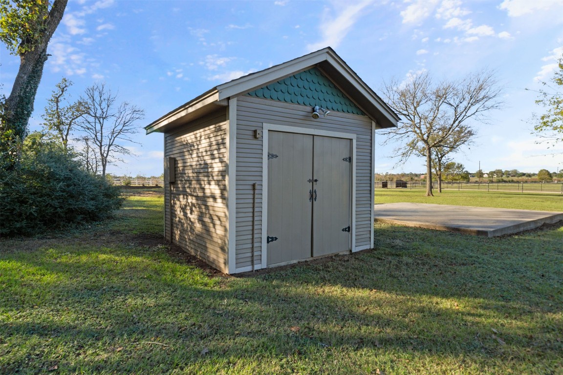 25948 Nelson Road Hempstead, TX 77445 - Photo 50 of 50 a view of a house with a yard