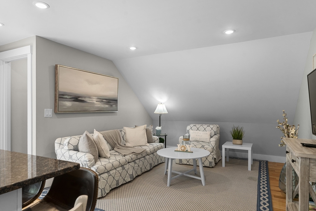 4 Hye Lane Edgartown, MA 02539 - Photo 31 of 41 a living room with furniture and a large window