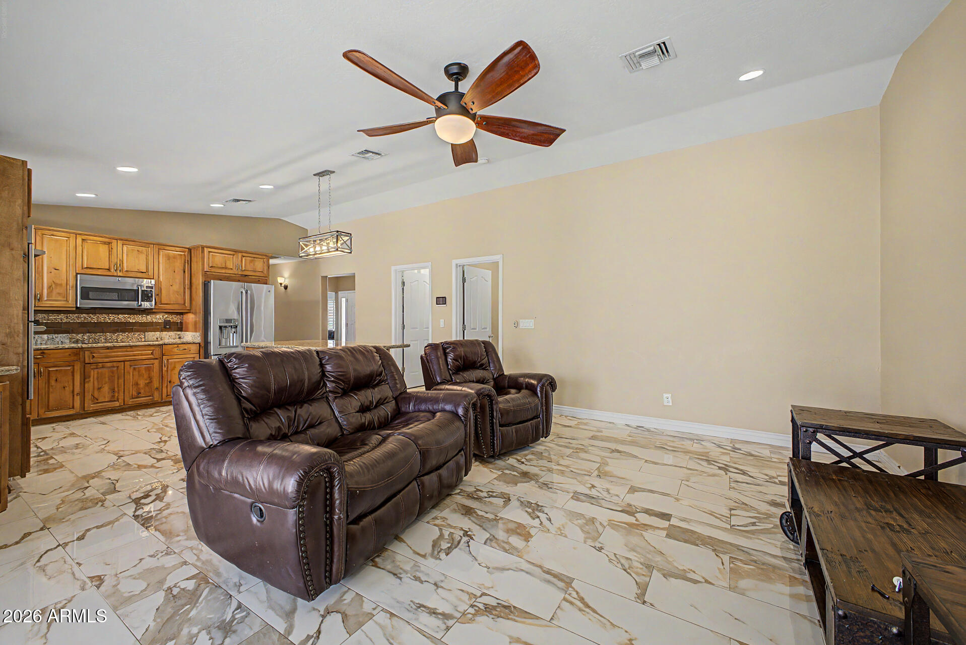 802 East Roberts Road Phoenix, AZ 85022 - Photo 5 of 24 a living room with furniture and kitchen view