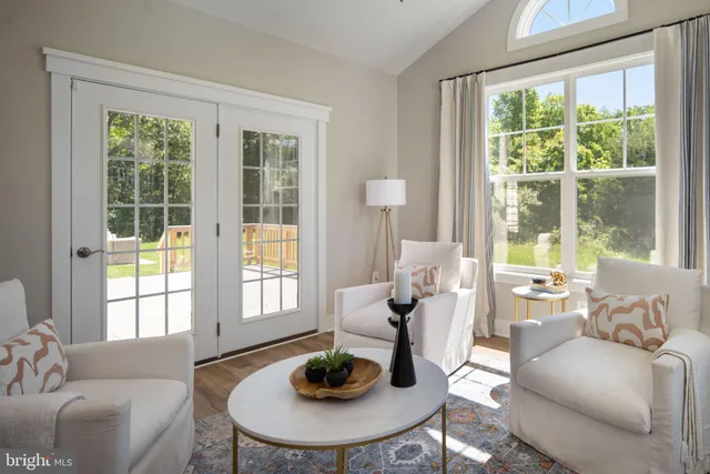 a bedroom with a bed and a dresser in it