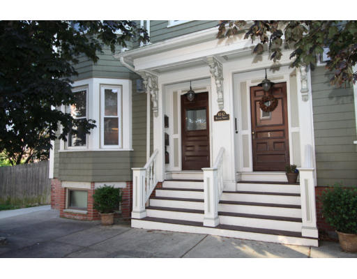 10 Beacon Street, Unit 1 Chelsea, MA 02150 - Photo 1 of 17 a front view of a house with a porch