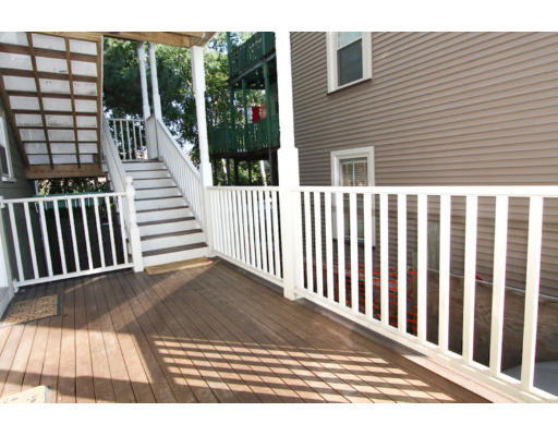 10 Beacon Street, Unit 1 Chelsea, MA 02150 - Photo 14 of 17 a view of a balcony with wooden floor