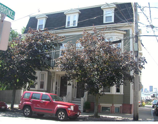 10 Beacon Street, Unit 1 Chelsea, MA 02150 - Photo 15 of 17 a front view of a building with parking