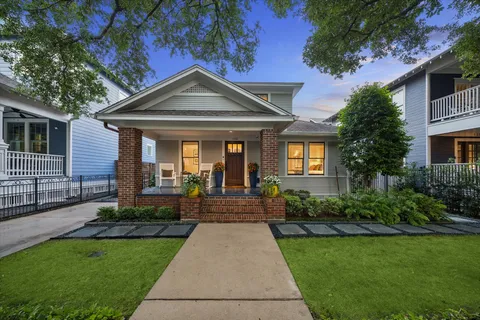 a front view of a house with yard