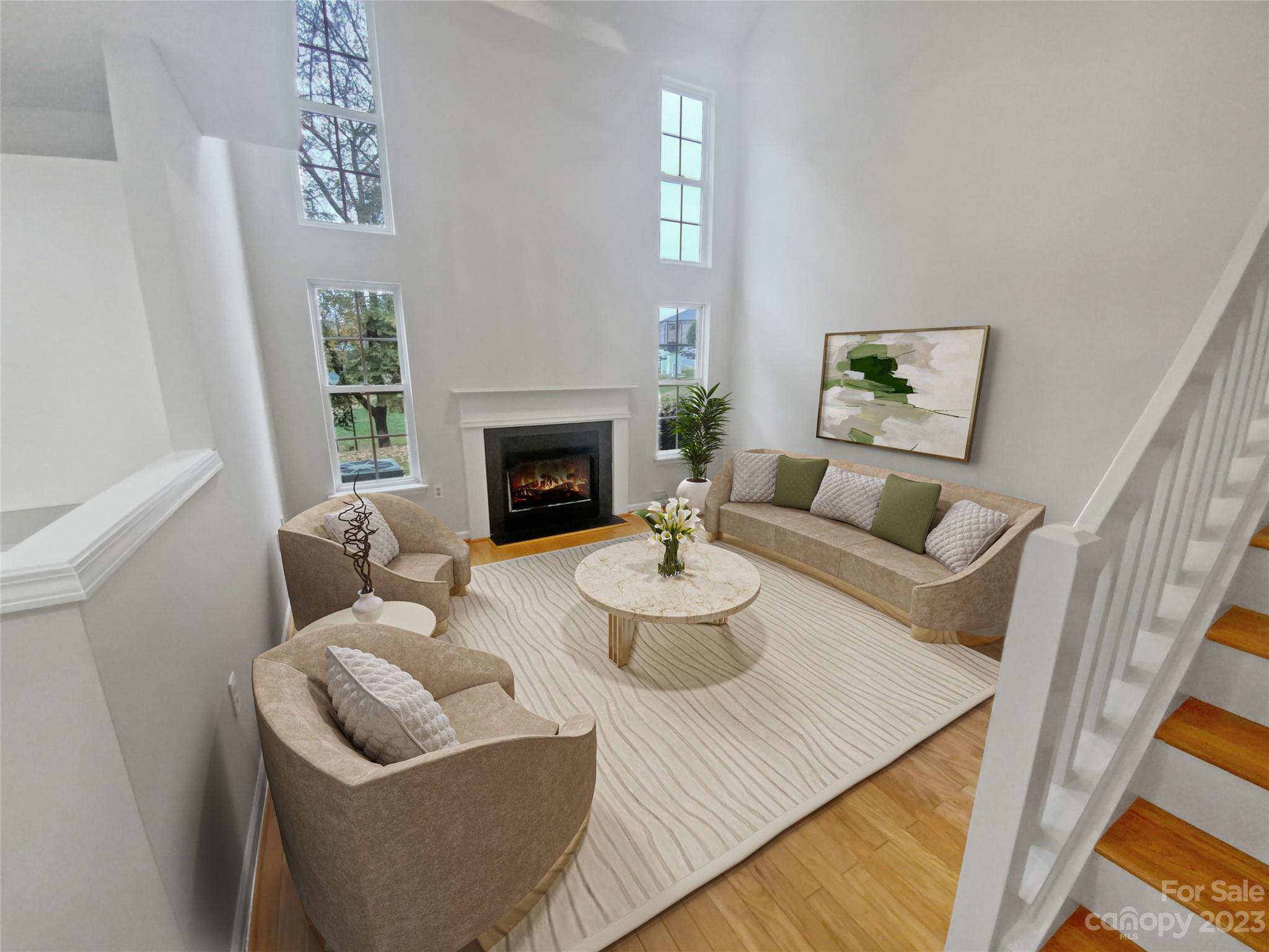 414 Robin Reed Court Pineville, NC 28134 - Photo 2 of 27 a living room with furniture and a fireplace