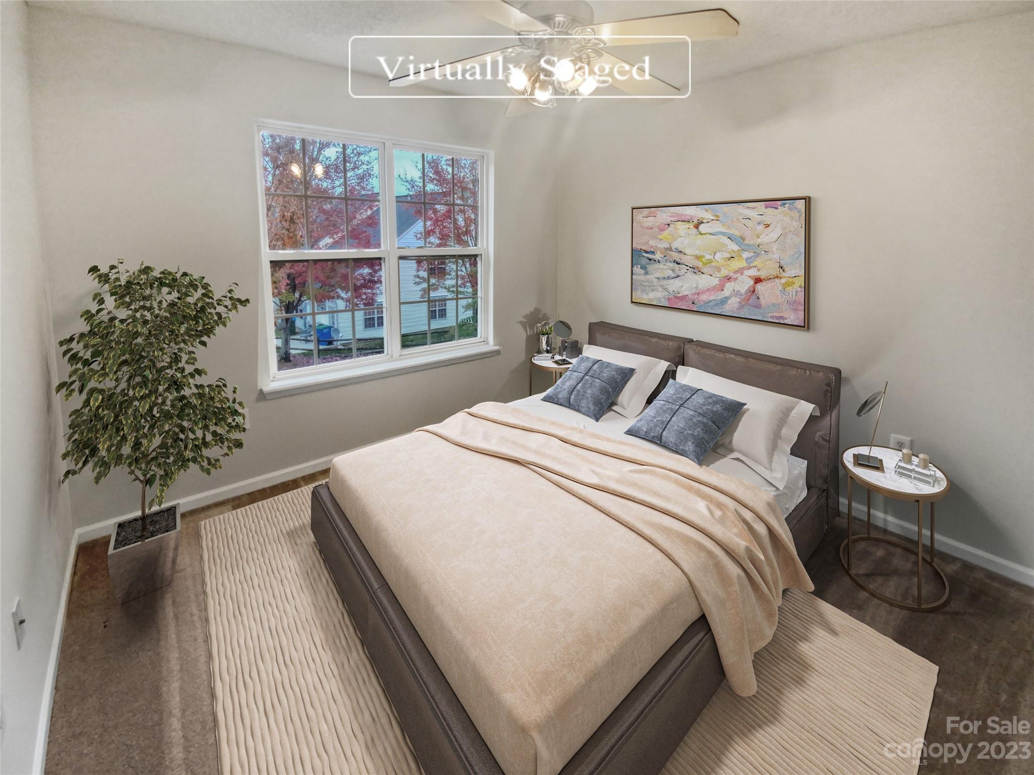 414 Robin Reed Court Pineville, NC 28134 - Photo 4 of 27 a bedroom with a bed and a window