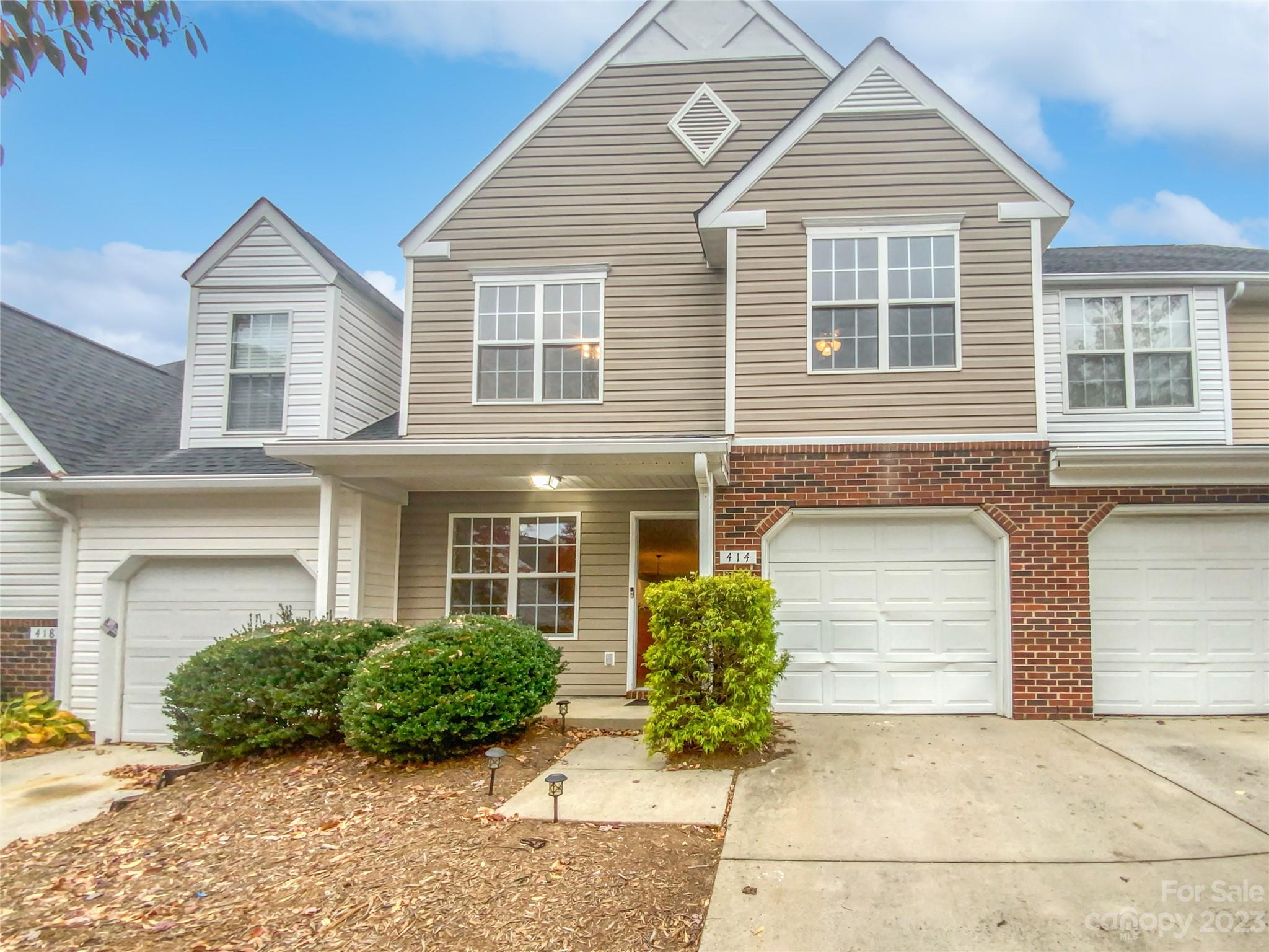 414 Robin Reed Court Pineville, NC 28134 - Photo 6 of 27 a view of a house with a yard
