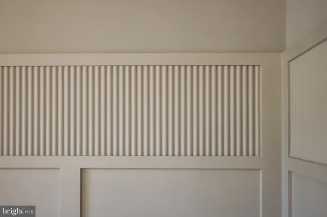 a close up of a white wall