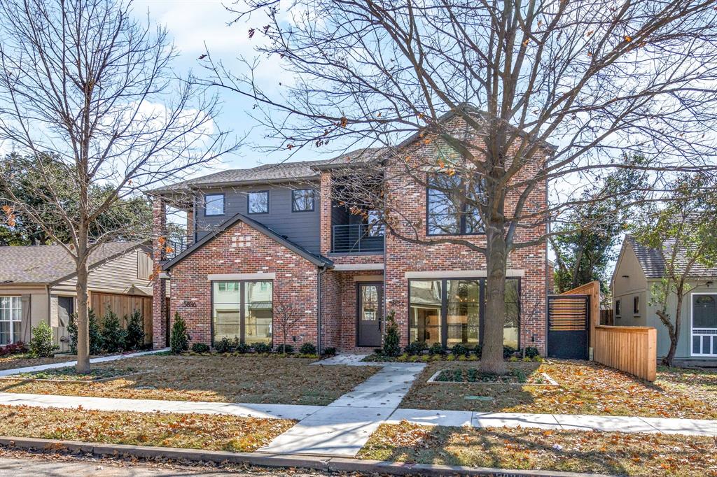 5834 Martel Avenue Dallas, TX 75206 - Photo 1 of 1 a front view of a house with garden