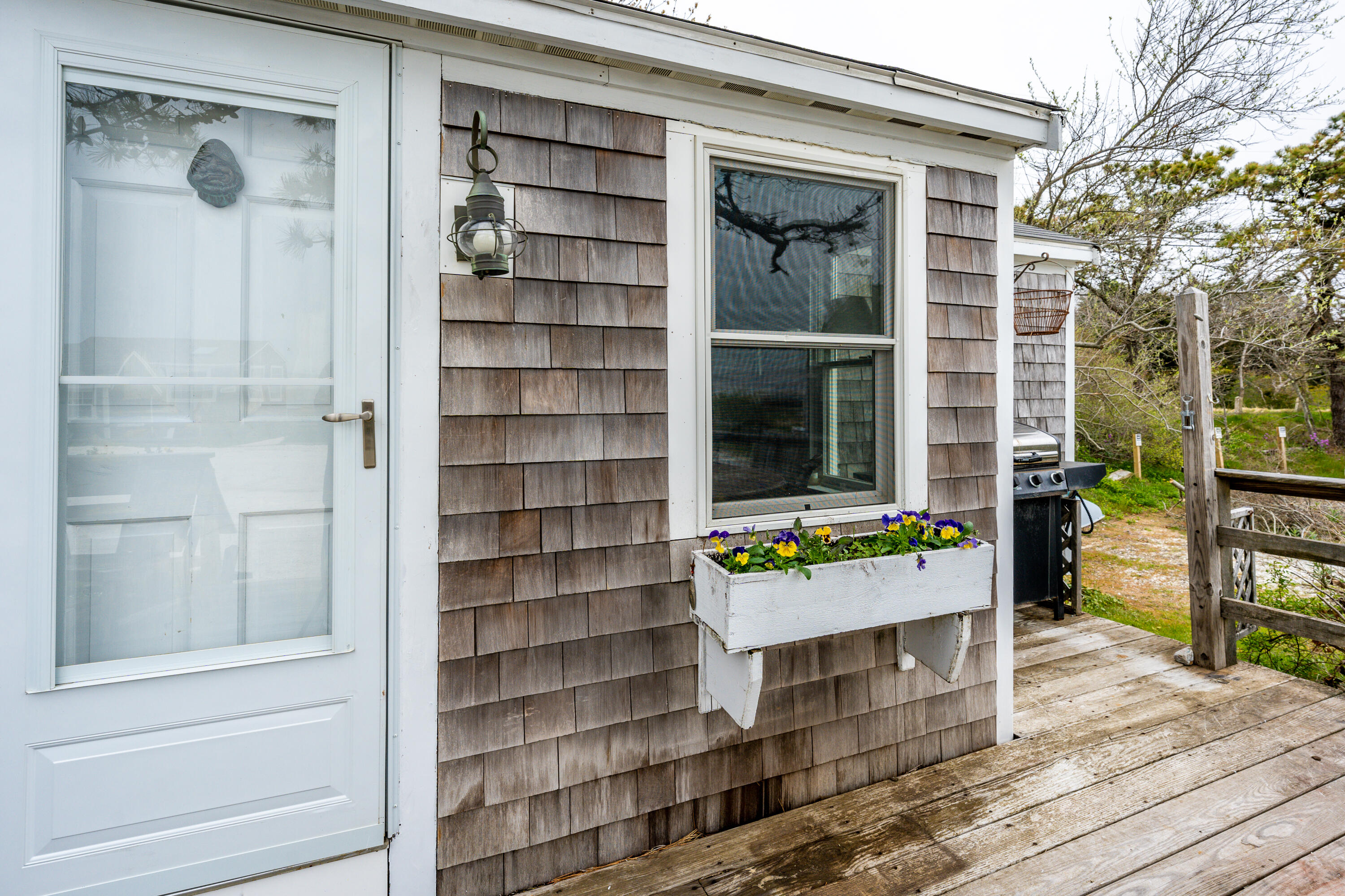 575 Chequessett Neck Road, Unit KSCALLLOP Wellfleet, MA 02667 - Photo 8 of 17 a front view of a house with a window