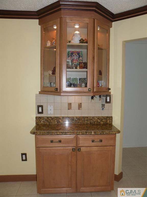 108 Orion Road Piscataway, NJ 08854 - Photo 4 of 16 a kitchen with stainless steel appliances granite countertop a sink and cabinets with wooden floor