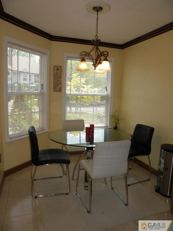 108 Orion Road Piscataway, NJ 08854 - Photo 5 of 16 a view of a dining room with furniture window and outside view
