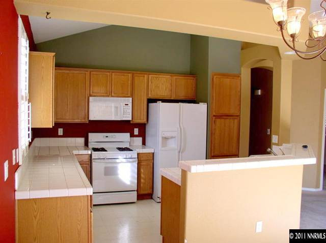9752 Ripple Way Reno, NV 89521 - Photo 3 of 13 a utility room with dryer and washer