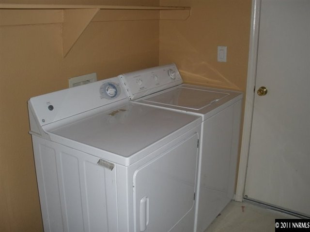 9752 Ripple Way Reno, NV 89521 - Photo 9 of 13 a utility room with dryer and washer