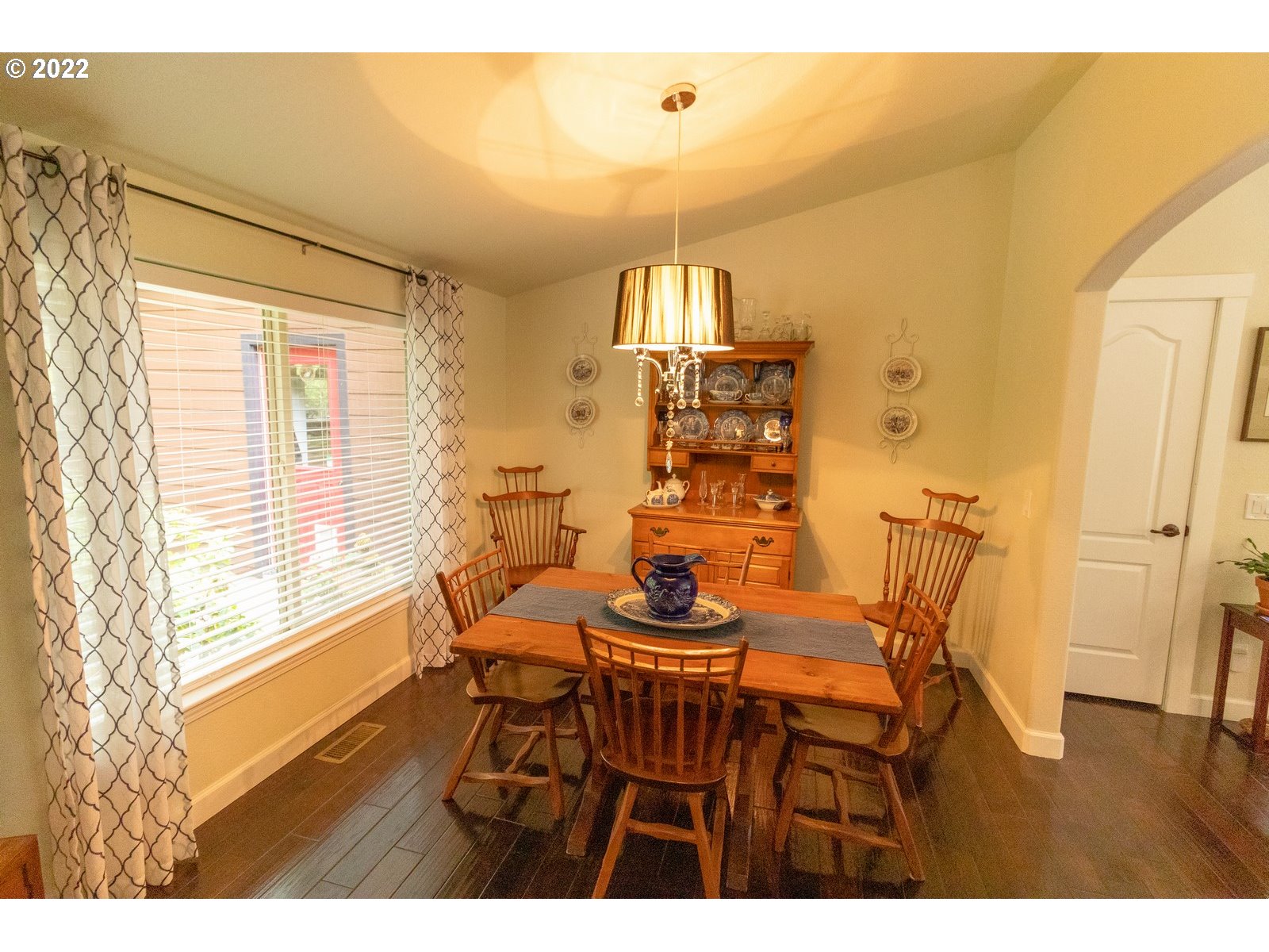 5732 Nicholson Road Florence, OR 97439 - Photo 15 of 31 a view of a dining room with furniture and wooden floor