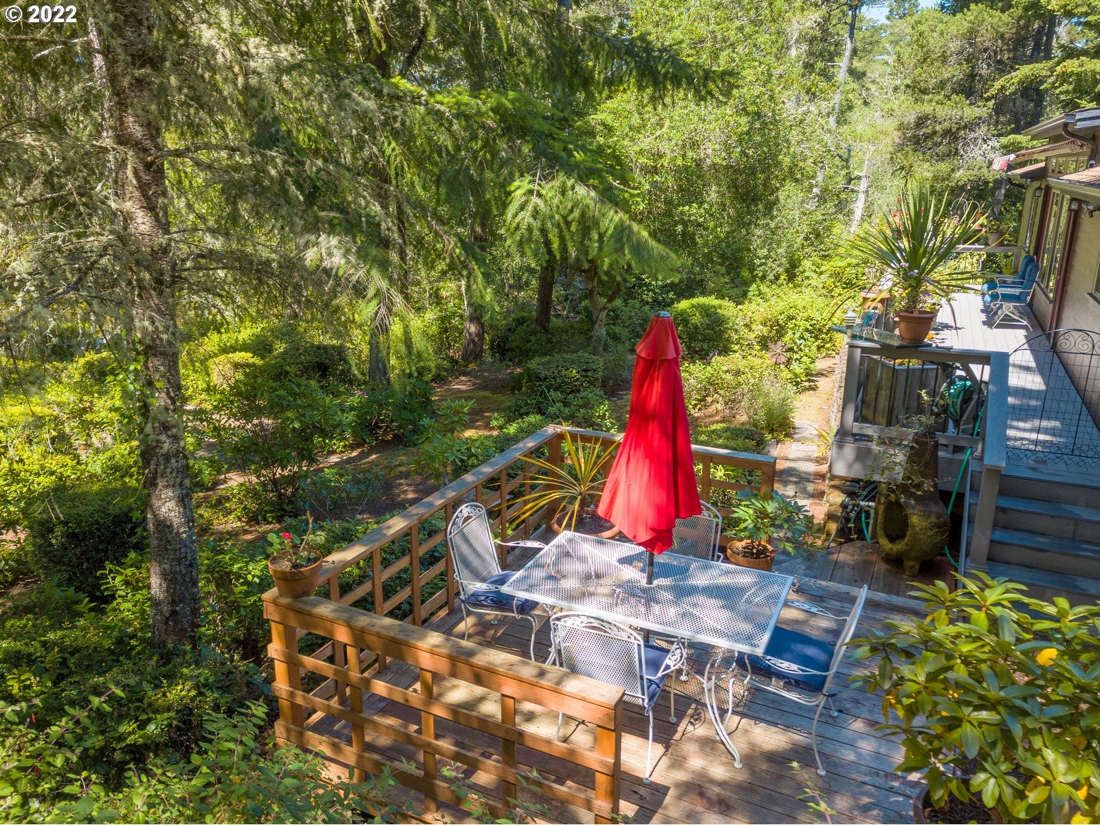 5732 Nicholson Road Florence, OR 97439 - Photo 25 of 31 a view of backyard with swimming pool and porch