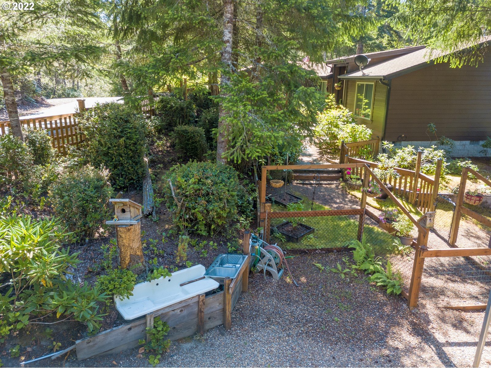 5732 Nicholson Road Florence, OR 97439 - Photo 27 of 31 a view of a backyard with sitting area
