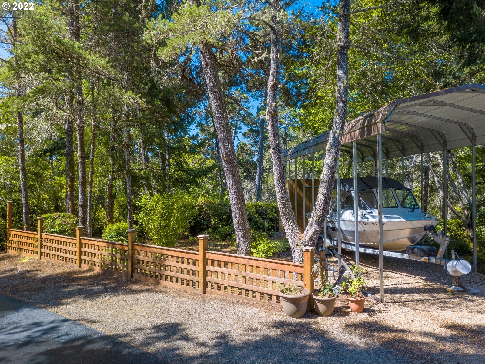 5732 Nicholson Road Florence, OR 97439 - Photo 5 of 31 a view of a wooden deck and a yard