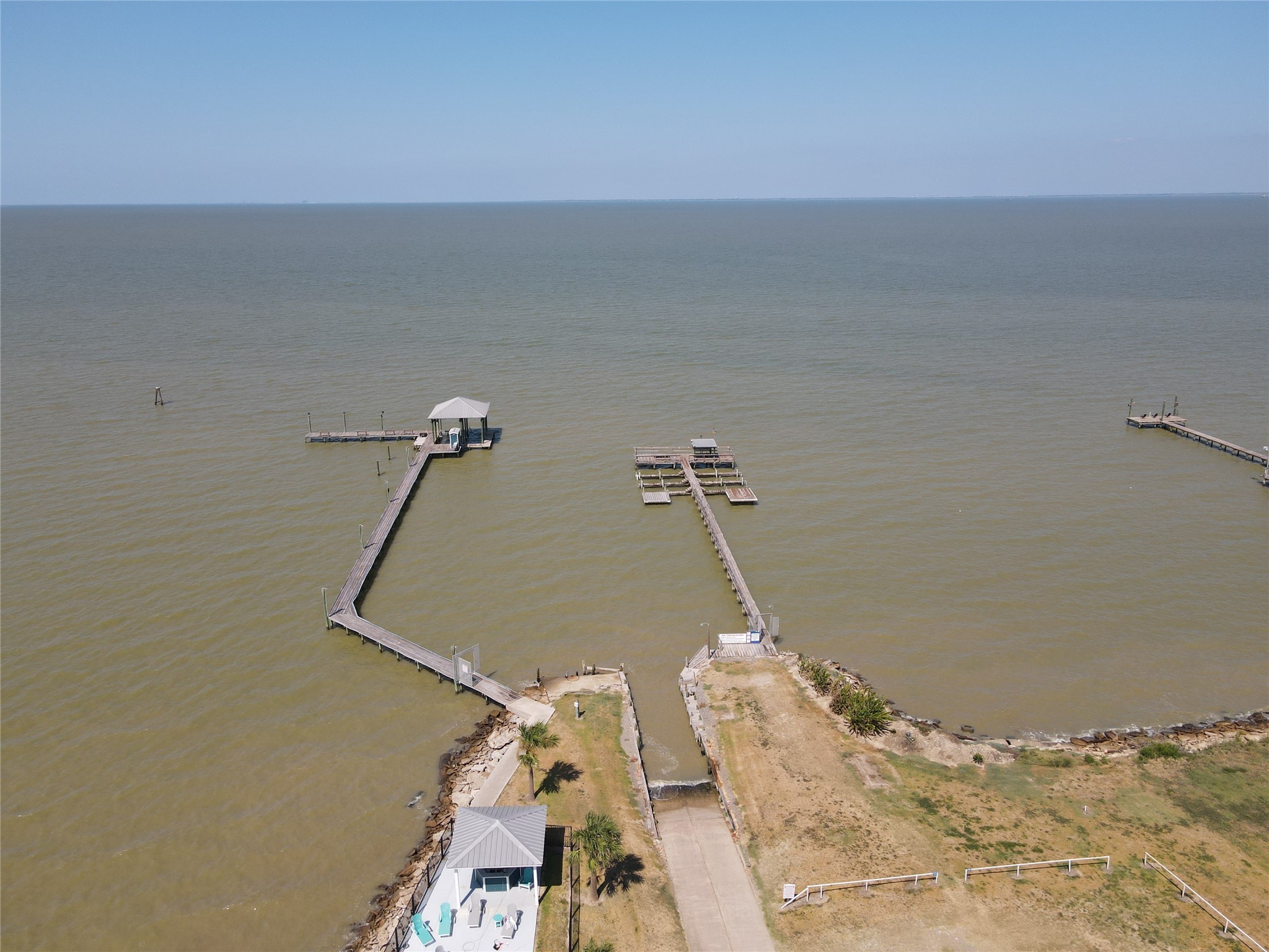 7-8 Cardinal Lane Anahuac, TX 77514 - Photo 5 of 9 a view of a bedroom