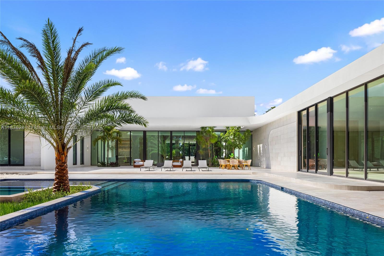 a view of a swimming pool with a patio