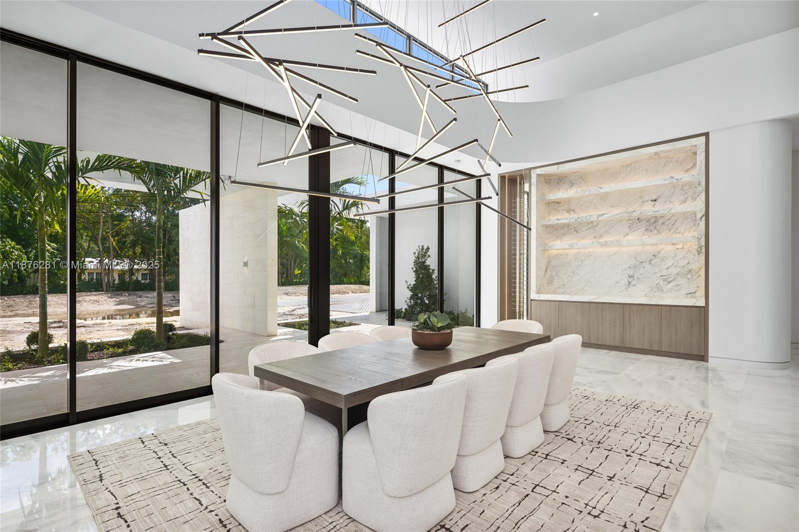 5671 Southwest 130th Avenue Southwest Ranches, FL 33330 - Photo 11 of 47 a view of a living room and a floor to ceiling window