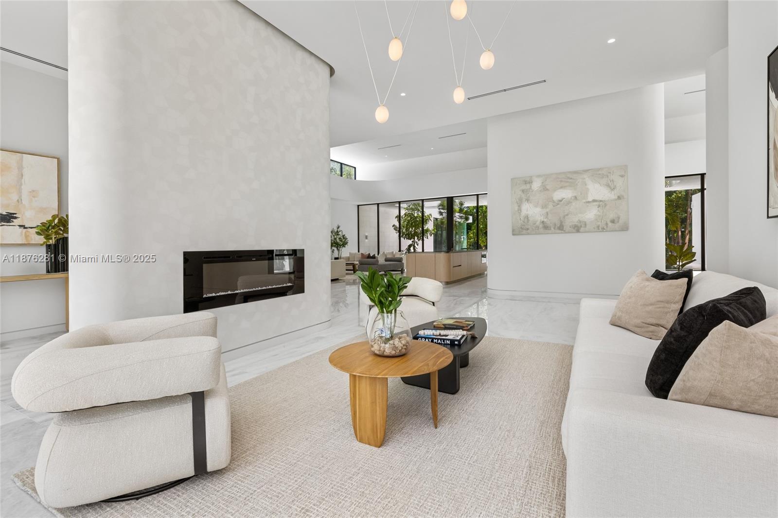 5671 Southwest 130th Avenue Southwest Ranches, FL 33330 - Photo 13 of 47 a living room with fireplace furniture and a flat screen tv