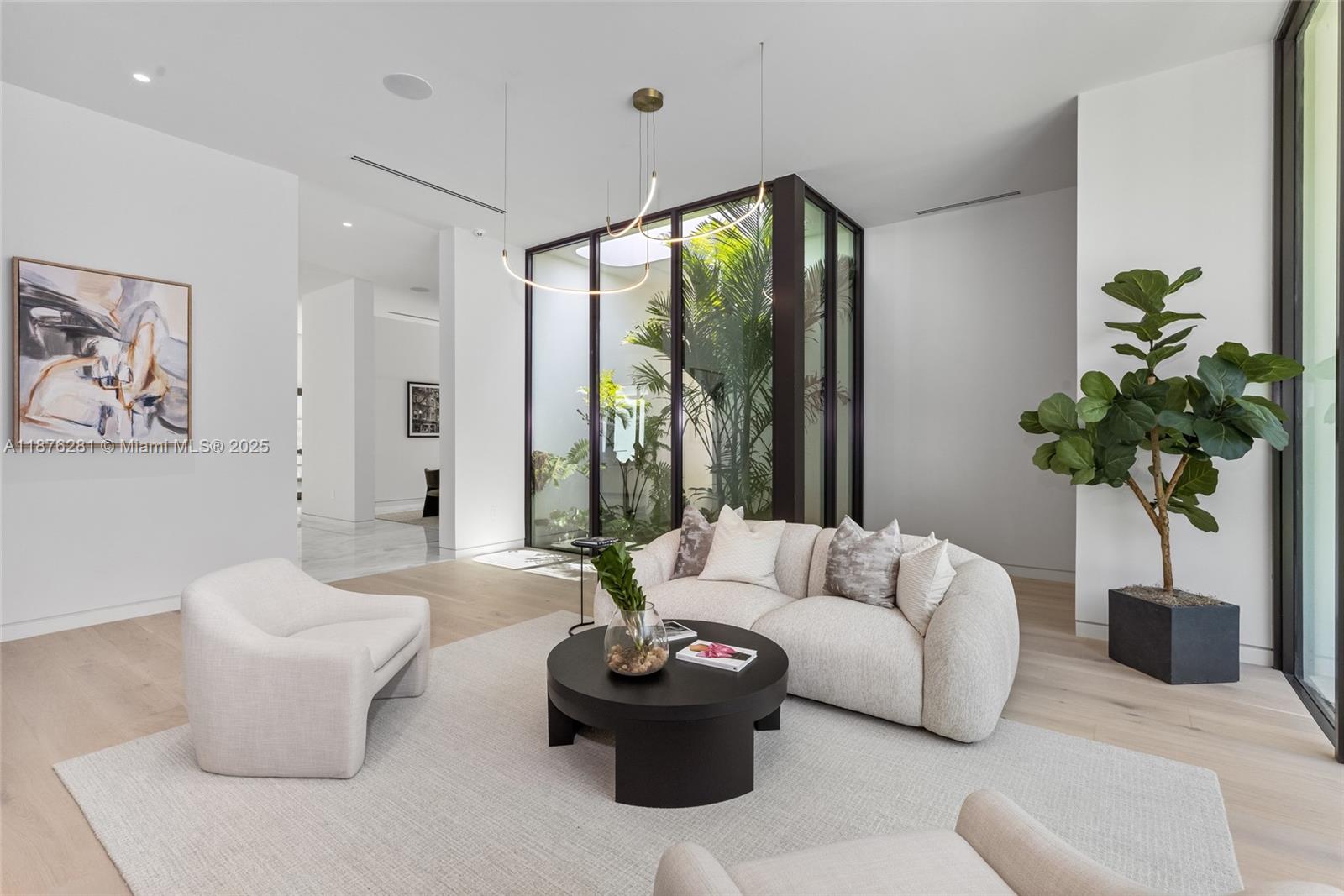 5671 Southwest 130th Avenue Southwest Ranches, FL 33330 - Photo 17 of 47 a living room with furniture and a potted plant
